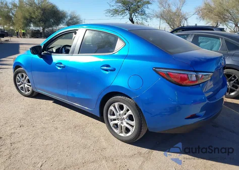 2018 Toyota Yaris Ia из США, поврежденный, VIN 3MYDLBYV9JY320091